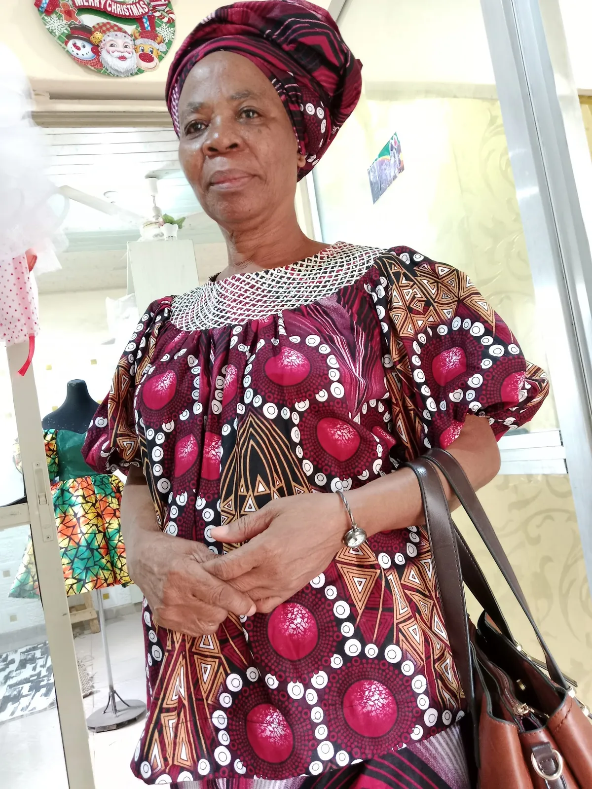 Client in a beaded Ankara outfit