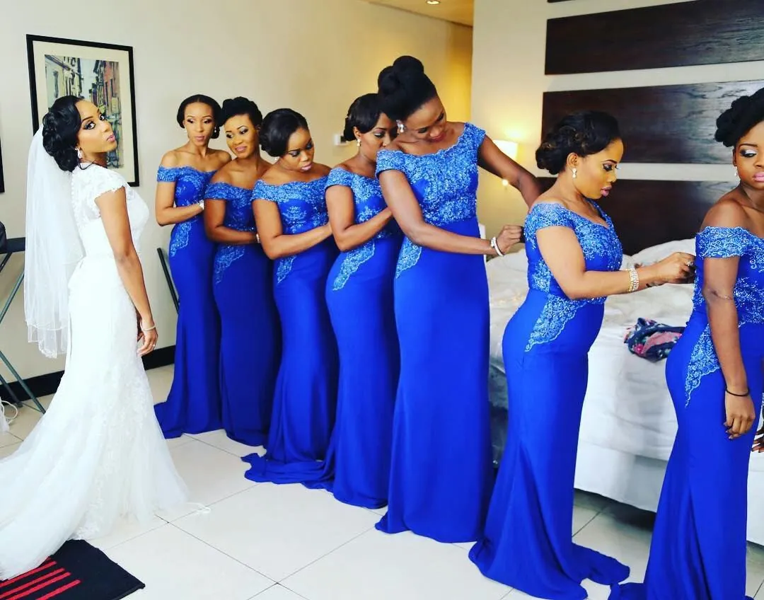 Bridal train in royal blue lace dresses