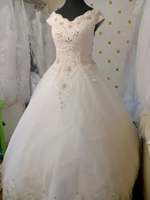 Lace ball gown with scattered beadwork