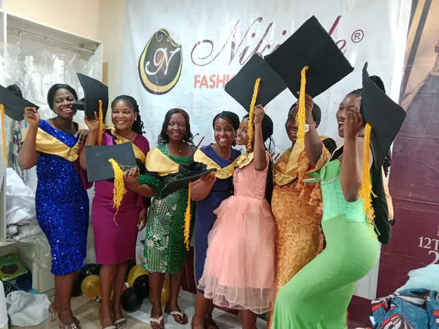 Nikjade Fashion School graduates celebrating in caps and stoles