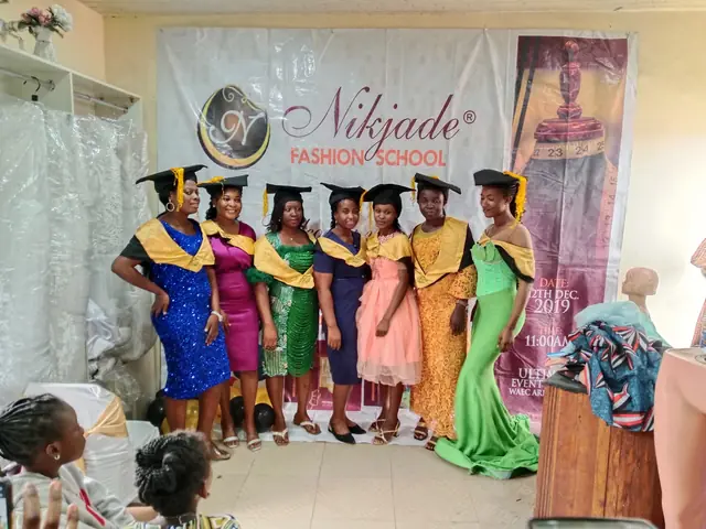 Graduates throwing caps at the Nikjade Fashion School ceremony