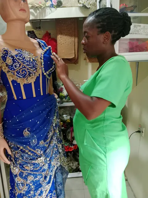 Fitting a royal blue beaded gown