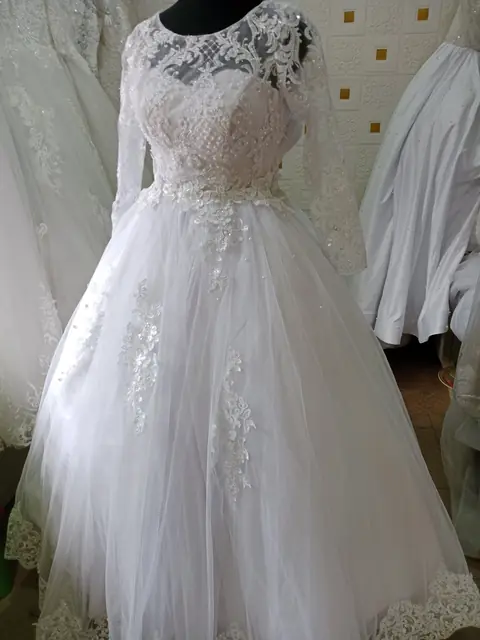 Tulle ball gown with lace appliqué
